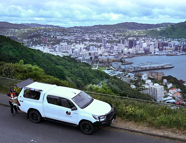 A Predator Free Wellington ute and field operator near the summit of Mt Victoria